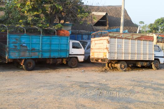 Two cattle trucks park along the Nairobi road to Mombasa in Kenya