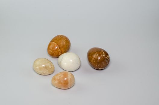 Egg made of stone isolated on white background