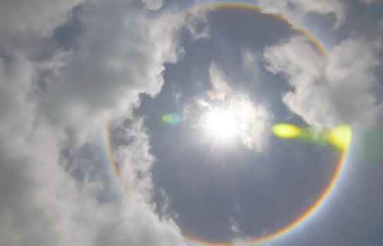 Sun with circular rainbow  sun halo occurring due to ice crystals in atmosphere in thai