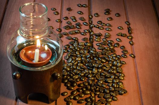 Glass lamps with bamboo coffee beans on Wood surface