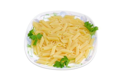 Cooked cylinder-shaped pasta decorated with a small parsley twigs on a dish on a light background
