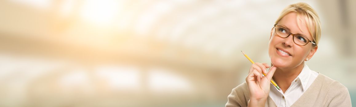 Contemplative Young Adult Woman Looking Off To The Side Wide Banner with Room For Text.