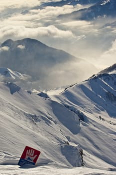 Snow peaks of the mountains in the day time