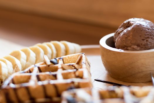 Belgian waffles with fruit and chocolate, forest fruit, all homemade, delicious batter.