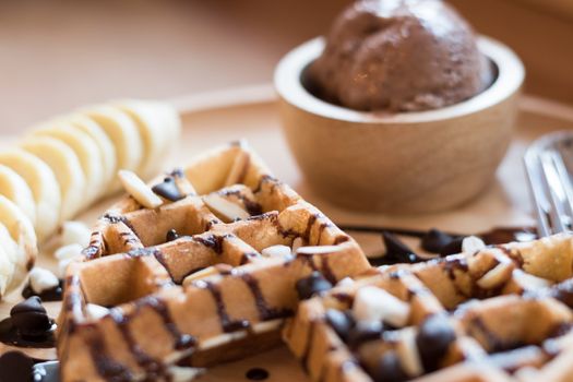 delicious sweet dessert : homemade waffle with chocolate sauce ,selective focus.