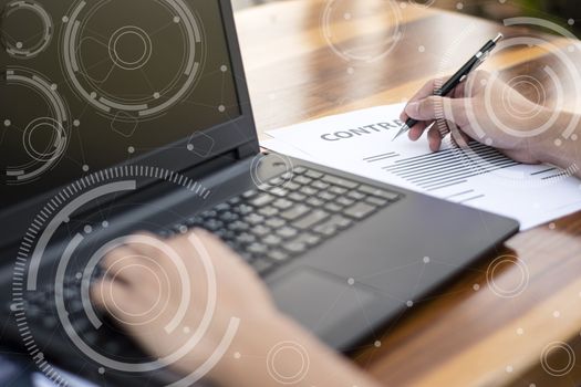 businessman hand working with new modern computer and business strategy as concept