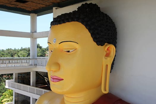 High Buddha statue in a Buddhist temple, Weherahena, Matara, Sri Lanka