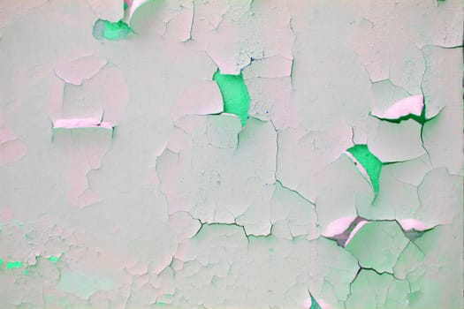 old cracked damaged plaster wall background. green