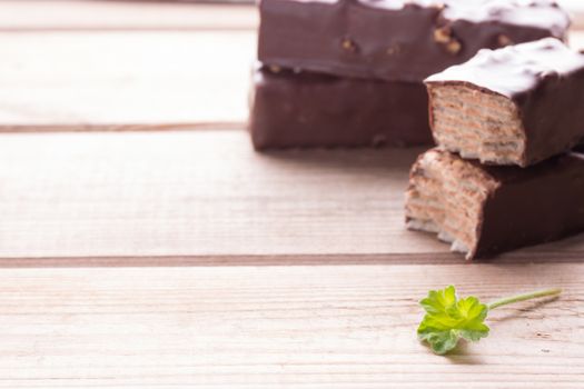 Chocolate Cookies with sesam and mint on wooden background