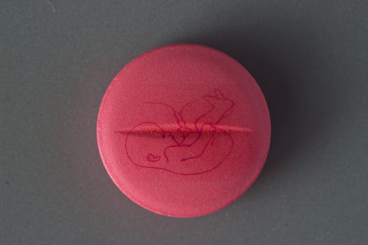 birth control tablet concept. baby paint on it
