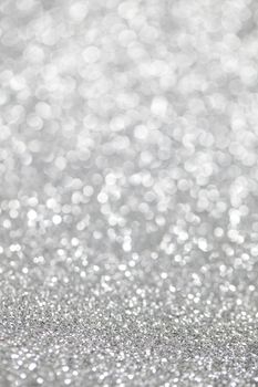 Abstract silver glitter light bokeh holiday party background