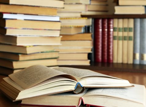 Many old books combined by a heap