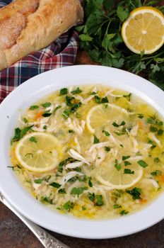 Avgolemono, greek   chicken soup with egg-lemon sauce, orzo and fresh parsley leaves
