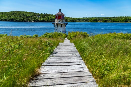 Squirrel Point Light is a lighthouse marking the southwestern point of Arrowsic Island on the Kennebec River. It was established in 1898, and is listed on the National Register of Historic Places.