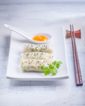 Spring Rolls with Sauce on a white plate
