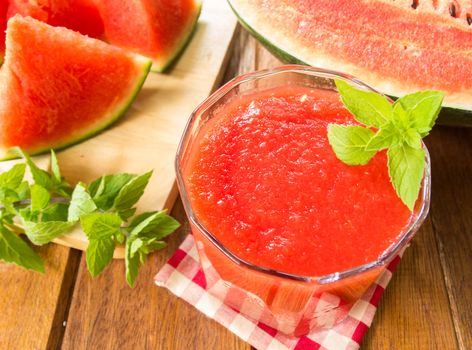 Watermelon juice with sliced fruit