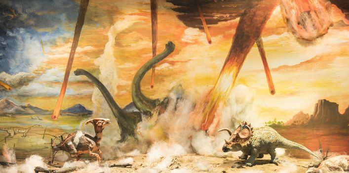 Dinosaurs escaping or dying because of heat and fire due to a big meteorite crash