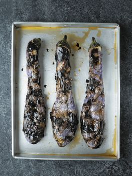 close up of rustic roasted aubergine