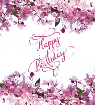 Frame of spring flowers on tree and text Happy Birthday, Calligraphy lettering.