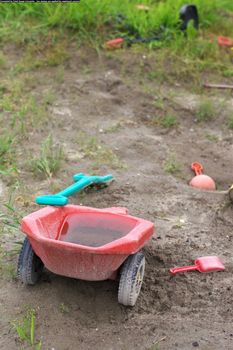 old toys in an abandoned playground