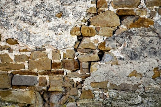 background detail stone wall with plaster subside