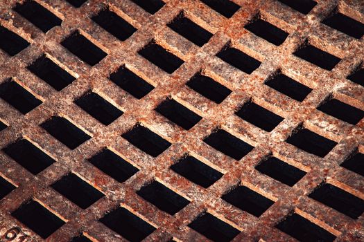 background rusty iron grid to sewerage