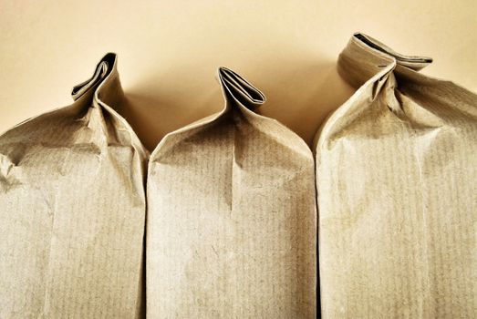 abstract background three sealed paper bags
