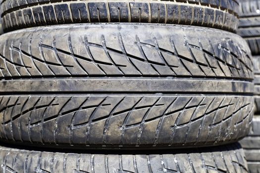 stack of used car tires