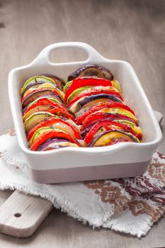 Tian vegetable casserole in a ceramic pan. Vegetarian food