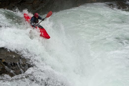 Kayaker in the waterfall in Norway, Ula river