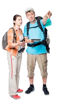 man and woman chosen route of travel with backpacks on a white background
