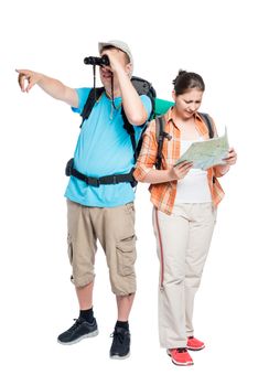 on a white background couple of travelers with backpacks isolated