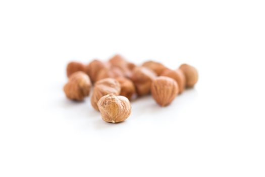 Hazelnuts isolated on white background