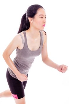 Teenage Asian girl jogging on white background