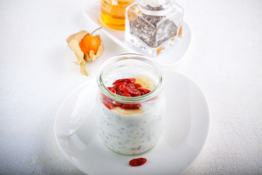 Yoghurt with goji berries, chia seeds and honey.