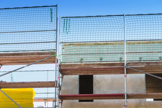 The construction of a settlement with turnkey prefabricated houses.
Prefabricated house under construction