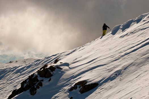 Freerider skiing in the mountains of Siberia