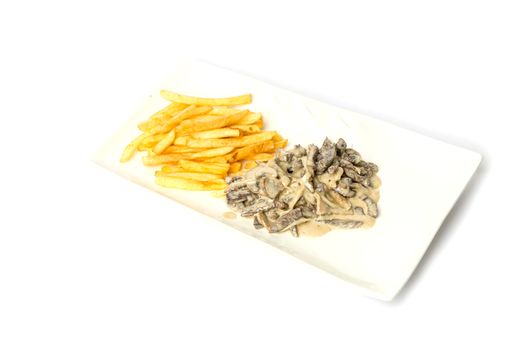 Beef stroganoff with potatoes on a white plate