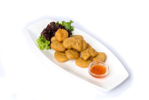 Fried chicken nuggets and sweet chili sauce