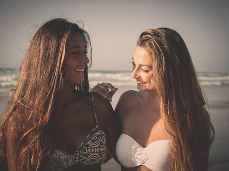 Best friends having fun on the beach 