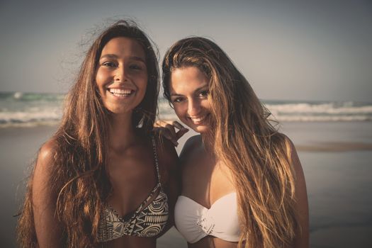 Best friends having fun on the beach 