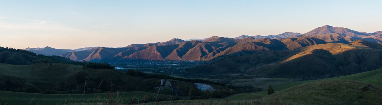 Village landscape panorama in the evening, Siberia, Russia