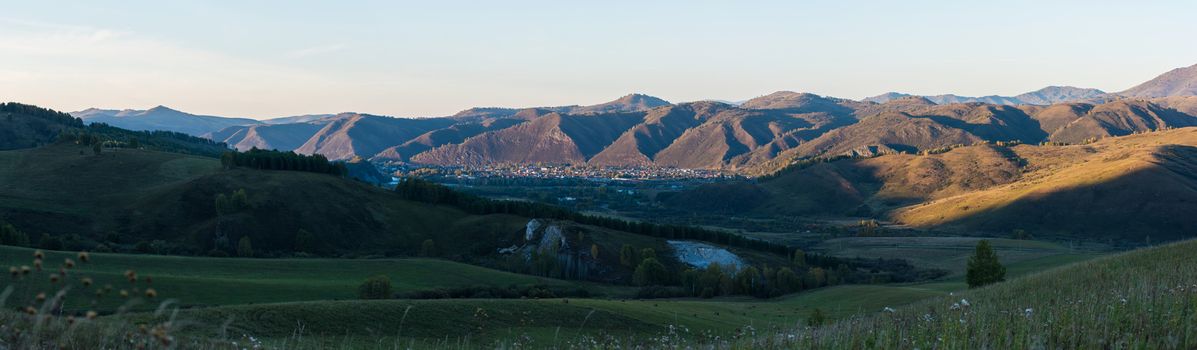 Village landscape panorama in the evening, Siberia, Russia