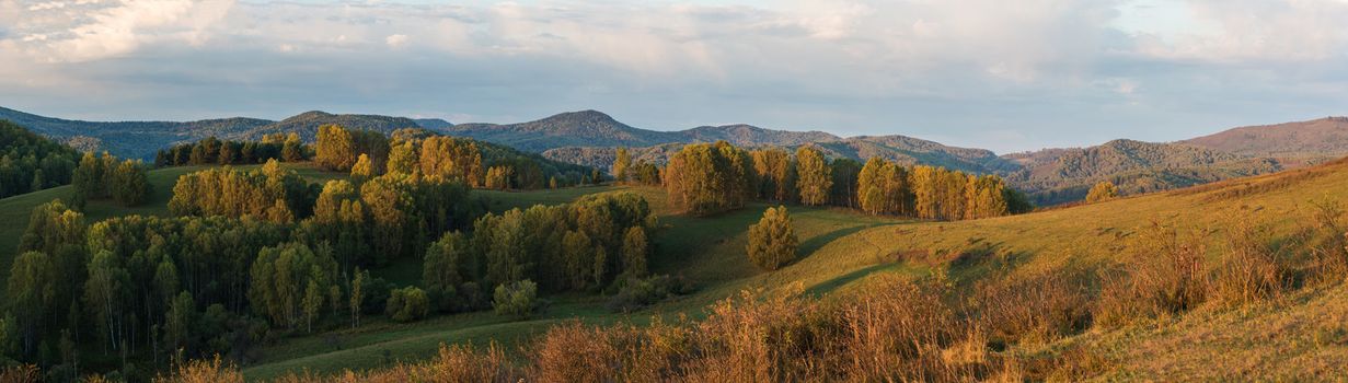 Beauty dawn in the mountains in Altay, panoramic picture