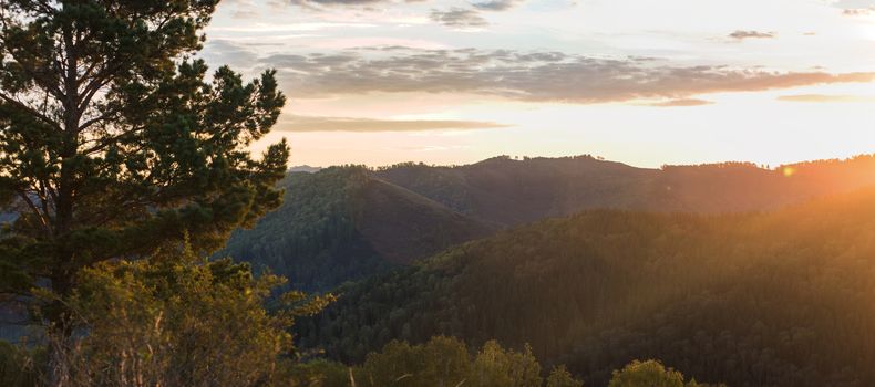 Beauty dawn in the mountains in Altay, panoramic picture