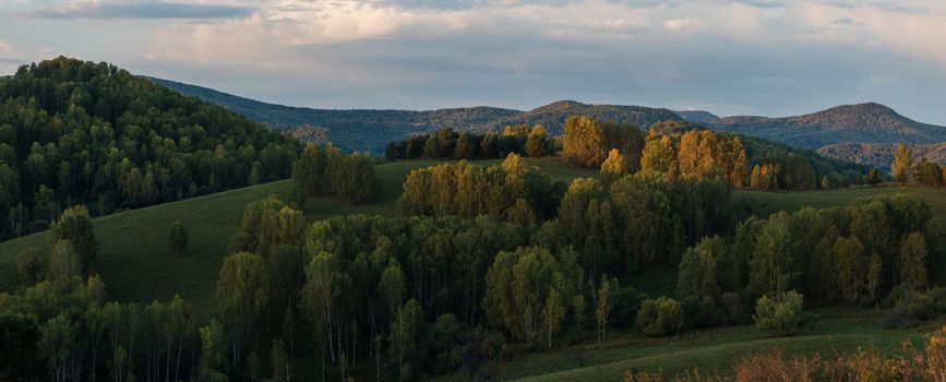 Beauty dawn in the mountains in Altay, panoramic picture