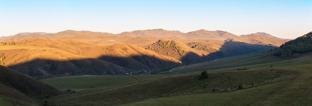 Village landscape panorama in the evening, Siberia, Russia