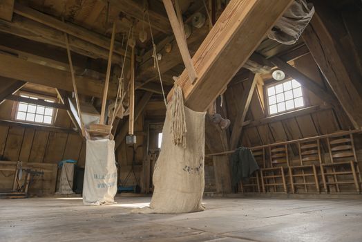Wooden interior of the historic corn mill Bataaf in Winterswijk in the Netherlands
