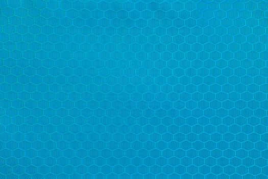 blue honeycomb background texture. Texture background of polyester fabric. Plastic weave fabric pattern