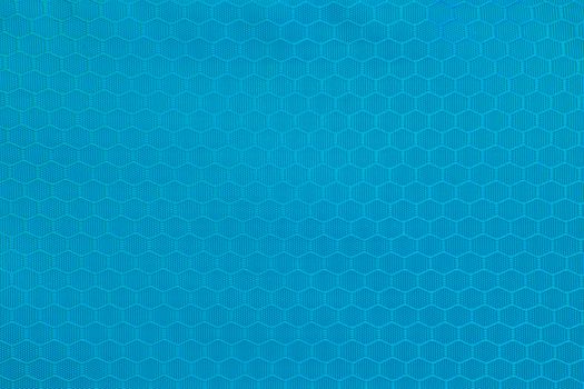 blue honeycomb background texture. Texture background of polyester fabric. Plastic weave fabric pattern